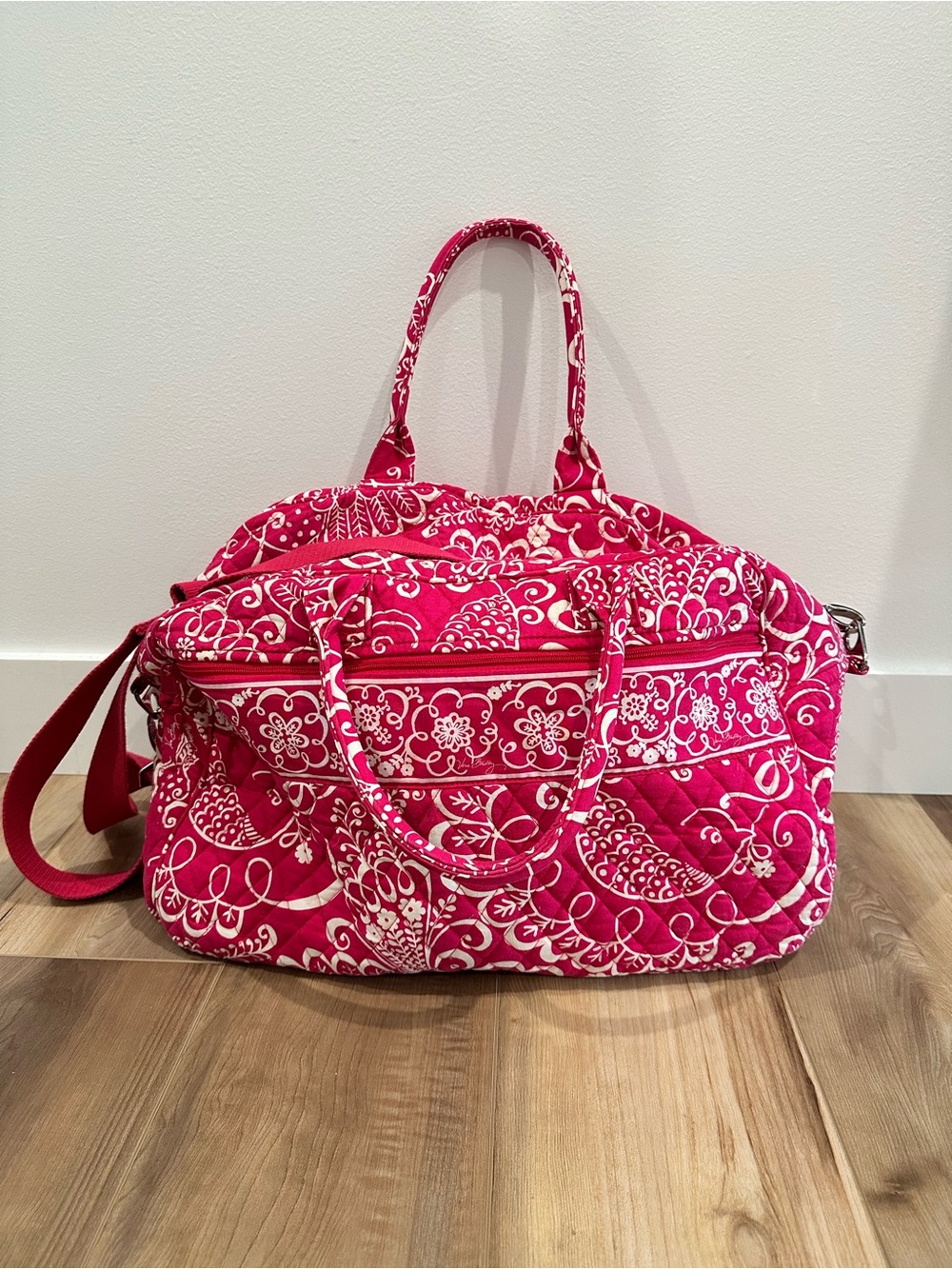 Vera Bradley Weekender bag in the retired Twirly Bird Pink pattern